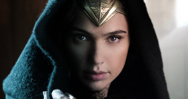 Gal Gadot as Wonder Woman with a cloak